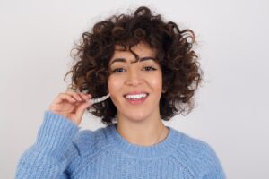 woman with clear aligner