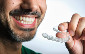 Prairie Village, KS, dentist offers clear aligners to straighten your smile 